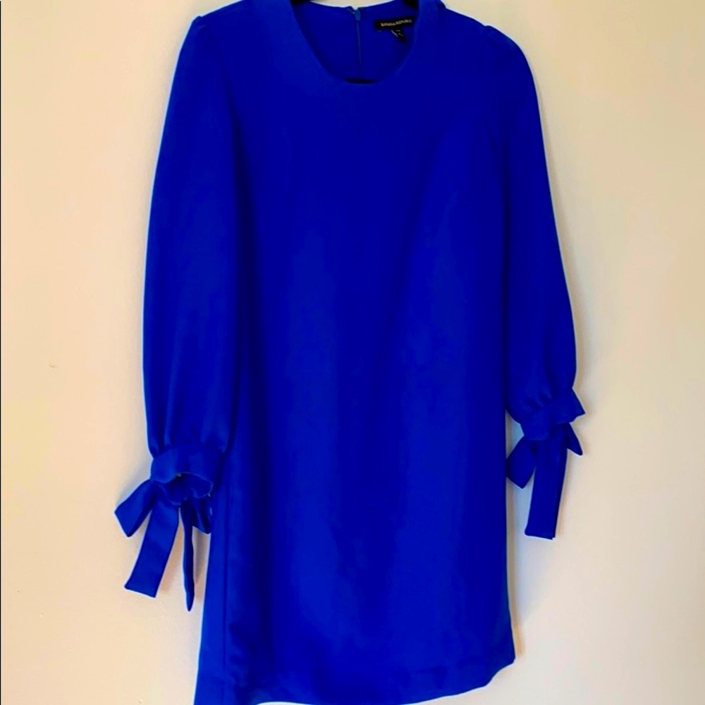 Blue shift dress with bows